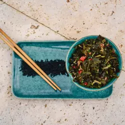 curly dehydrated wakame seaweed in raw salad