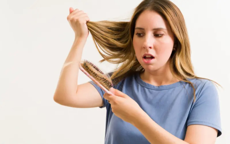 Why your hair is really falling out — and how to remedy it naturally